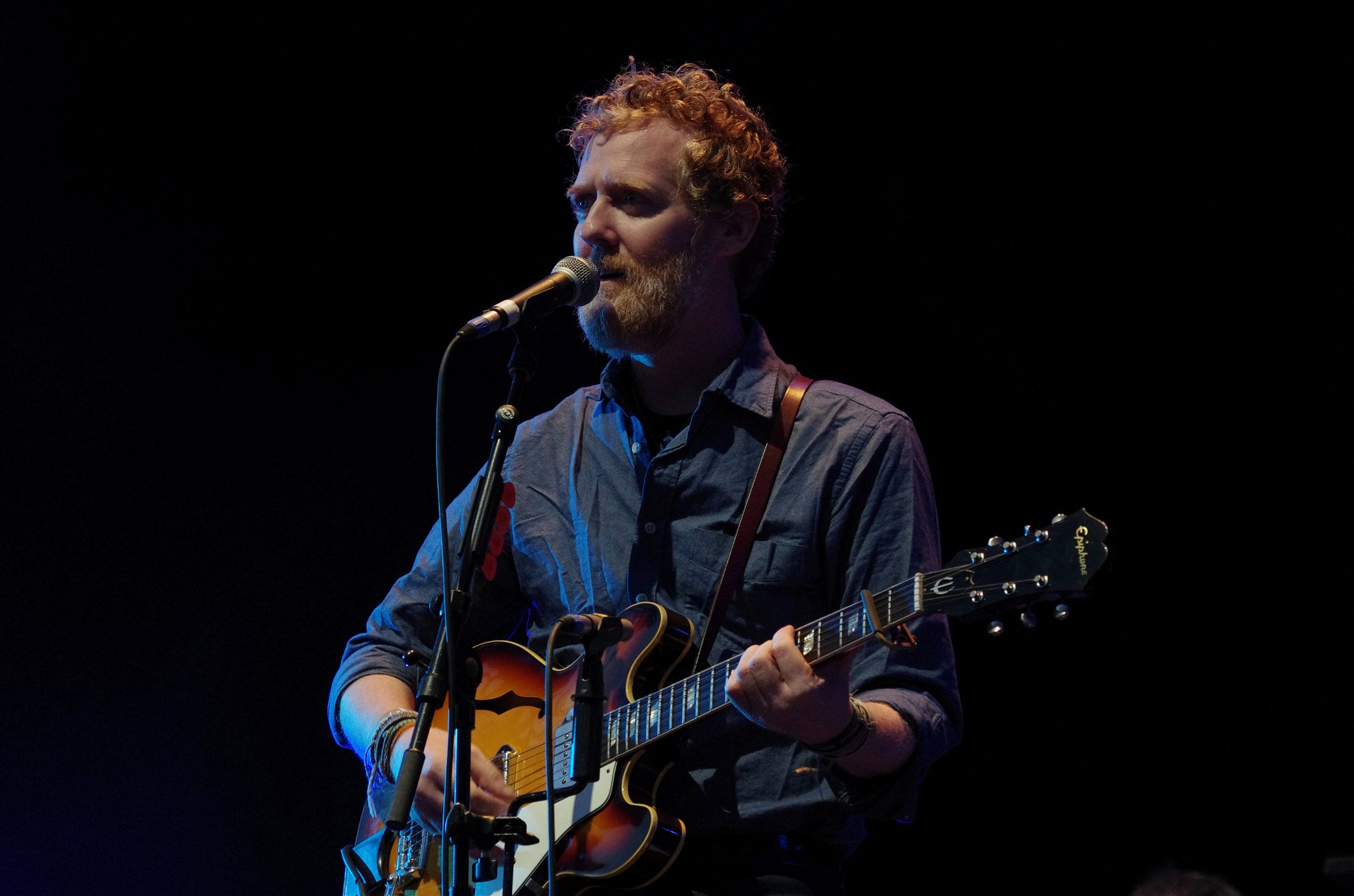 Glen Hansard singing and playing electric guitar at Haldern Pop in 2013